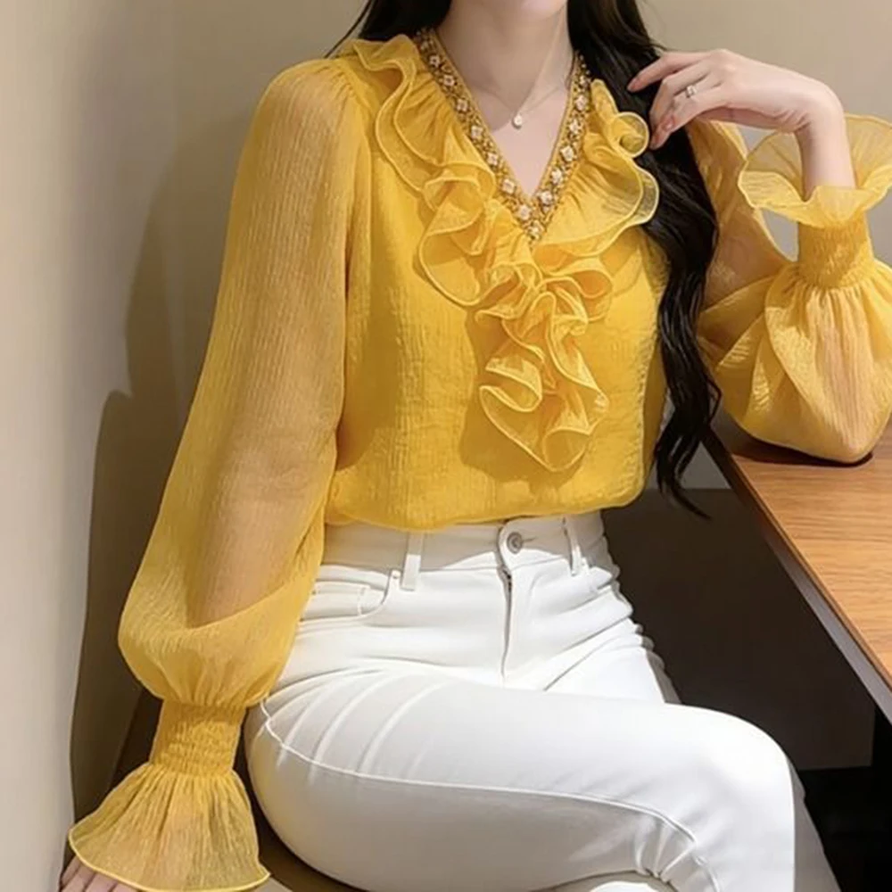 Yellow ruffle edge long-sleeved shirt women's 2026 new important occasion beautiful French light luxury temperament top spring
Yellow ruffle edge long-sleeved shirt women's 2026 new important occasion beautiful French light luxury temperament top spring
