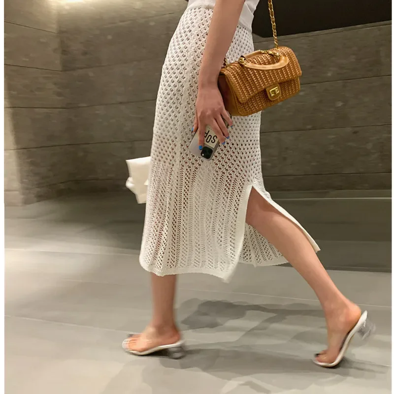 2024 New Summer Elegant Ladies Knitting Slim Bodycon Skirts Women Hollow Out Elastic High Waist Sexy Split Long Skirt White
2024 New Summer Elegant Ladies Knitting Slim Bodycon Skirts Women Hollow Out Elastic High Waist Sexy Split Long Skirt White