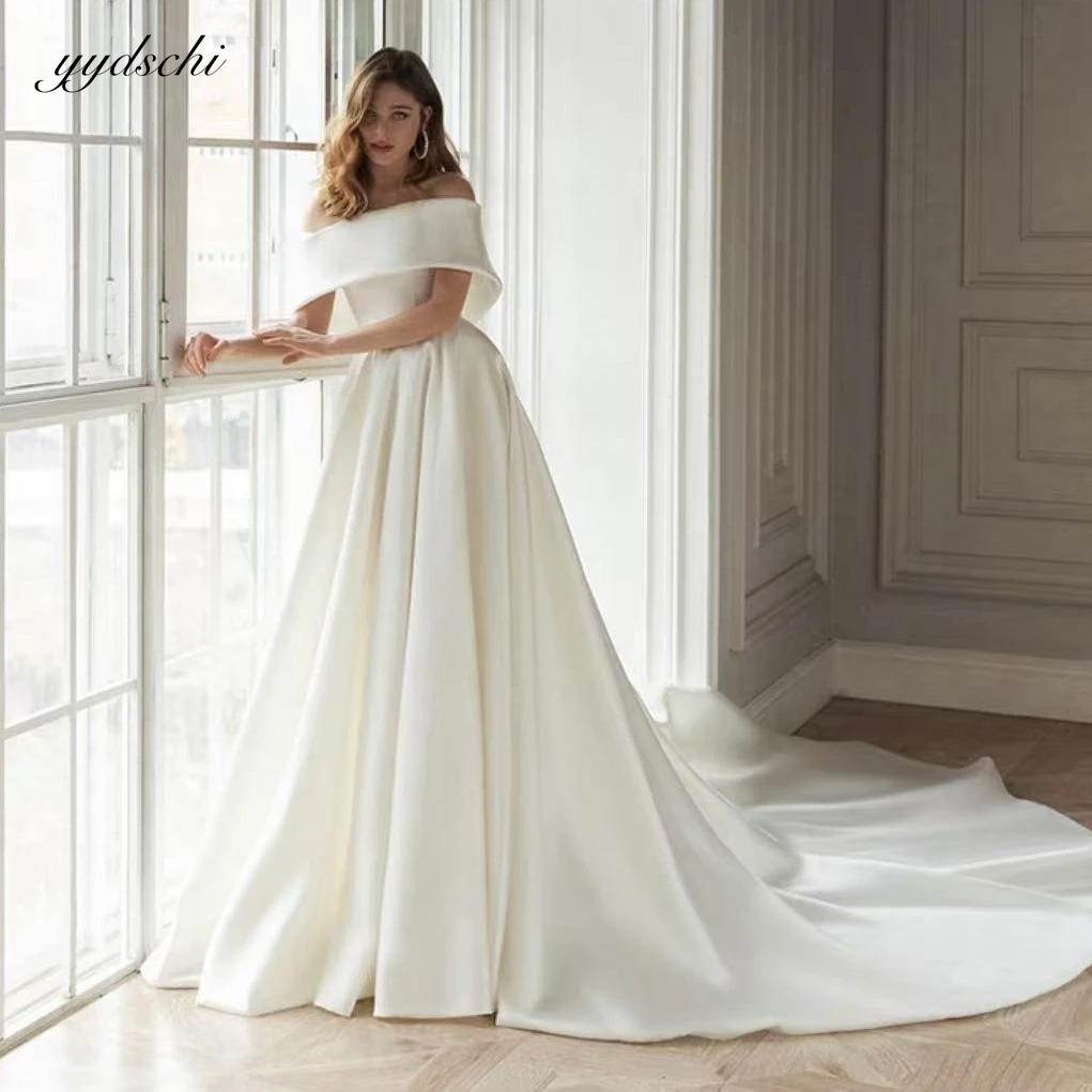 Customized Off The Shoulder Elegant Strapless Tulle A-Line Wedding Dresses 2025 Fashion Back Zipper Sweep Train Bridal Dresses
Customized Off The Shoulder Elegant Strapless Tulle A-Line Wedding Dresses 2025 Fashion Back Zipper Sweep Train Bridal Dresses