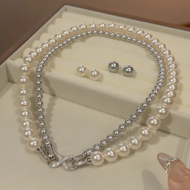 New Pearl Set Necklace Earrings Eight-Character Buckle Layered Double Chain Women's Silver Needle Fashion Versatile Wholesale
New Pearl Set Necklace Earrings Eight-Character Buckle Layered Double Chain Women's Silver Needle Fashion Versatile Wholesale