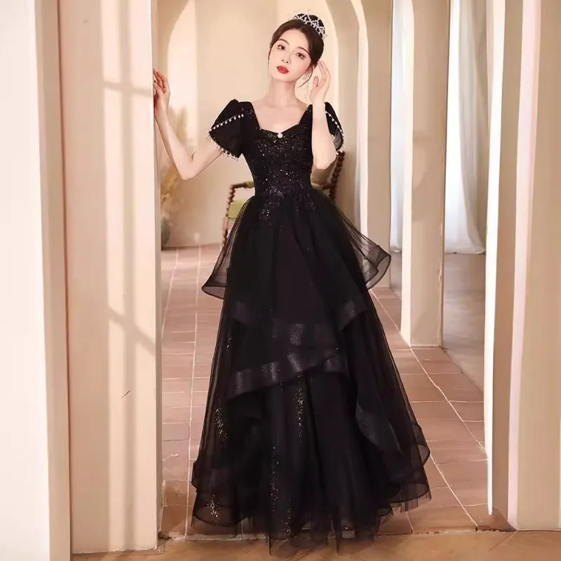 Black Evening Dress 2025 New Fashion Square Neck Sequined Fluffy Skirt Short Sleeve Pearl Formal Dress Women Elegant Party Dress
Black Evening Dress 2025 New Fashion Square Neck Sequined Fluffy Skirt Short Sleeve Pearl Formal Dress Women Elegant Party Dress