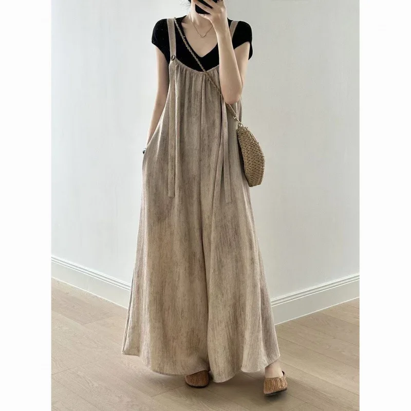 Summer New Loose Slimming Short Sleeved Shirt+wide Leg Pants Skirt Two-piece Set with Shoulder Straps
Summer New Loose Slimming Short Sleeved Shirt+wide Leg Pants Skirt Two-piece Set with Shoulder Straps