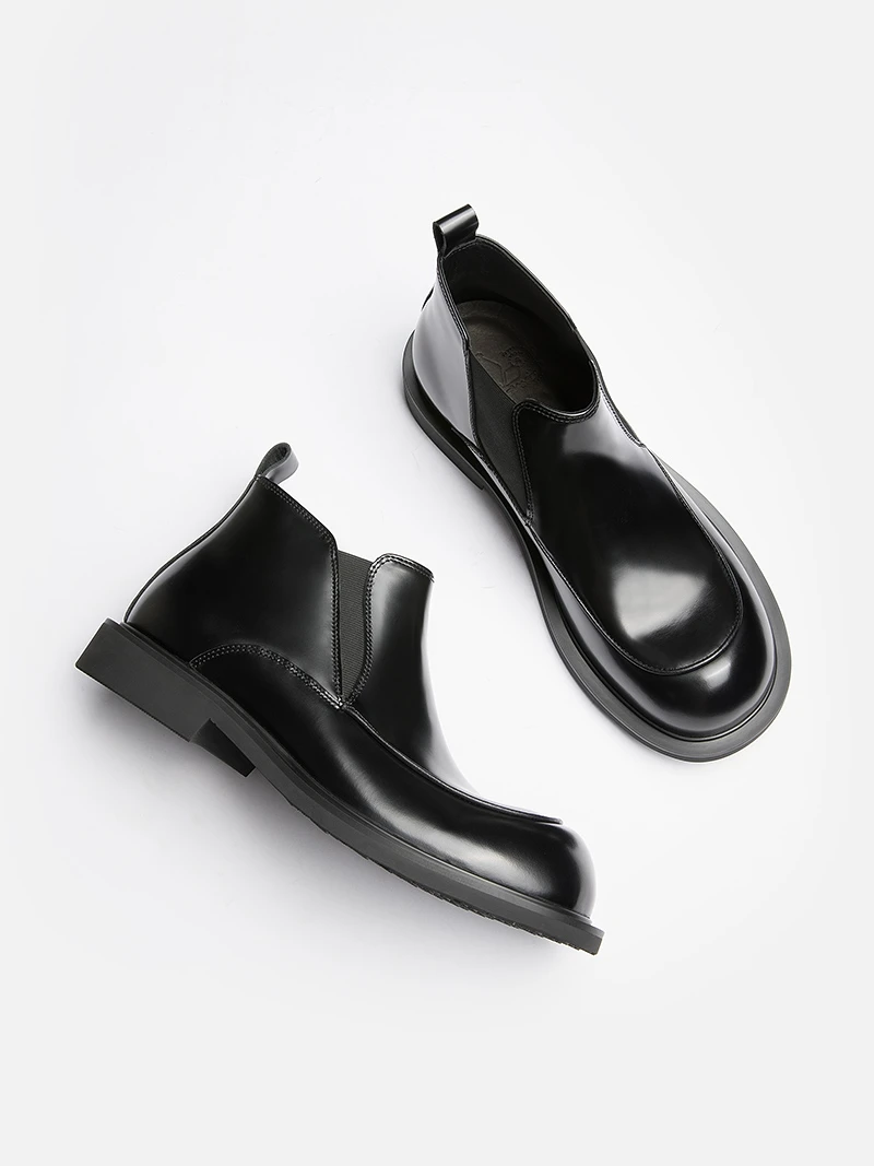 Autumn and Winter New Leather Men Boots British Leisure Chelsea Boots Retro Round-headed Men Shoes.
Autumn and Winter New Leather Men Boots British Leisure Chelsea Boots Retro Round-headed Men Shoes.
