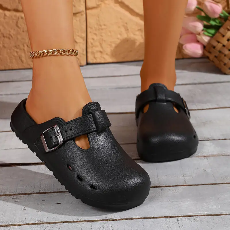 Fashion Metal Buckle Non Slip Clogs Women Summer 2026 Soft Thick Bottom Hollow Out Beach Slippers Woman Platform Mules Slippers
Fashion Metal Buckle Non Slip Clogs Women Summer 2026 Soft Thick Bottom Hollow Out Beach Slippers Woman Platform Mules Slippers