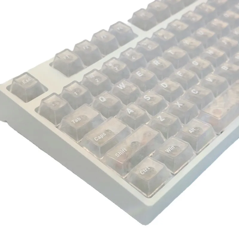 Spot cross-border luminous engraving 132 key small full set of original PBT magnetic axis transparent white carbon fiber keycaps
Spot cross-border luminous engraving 132 key small full set of original PBT magnetic axis transparent white carbon fiber keycaps
