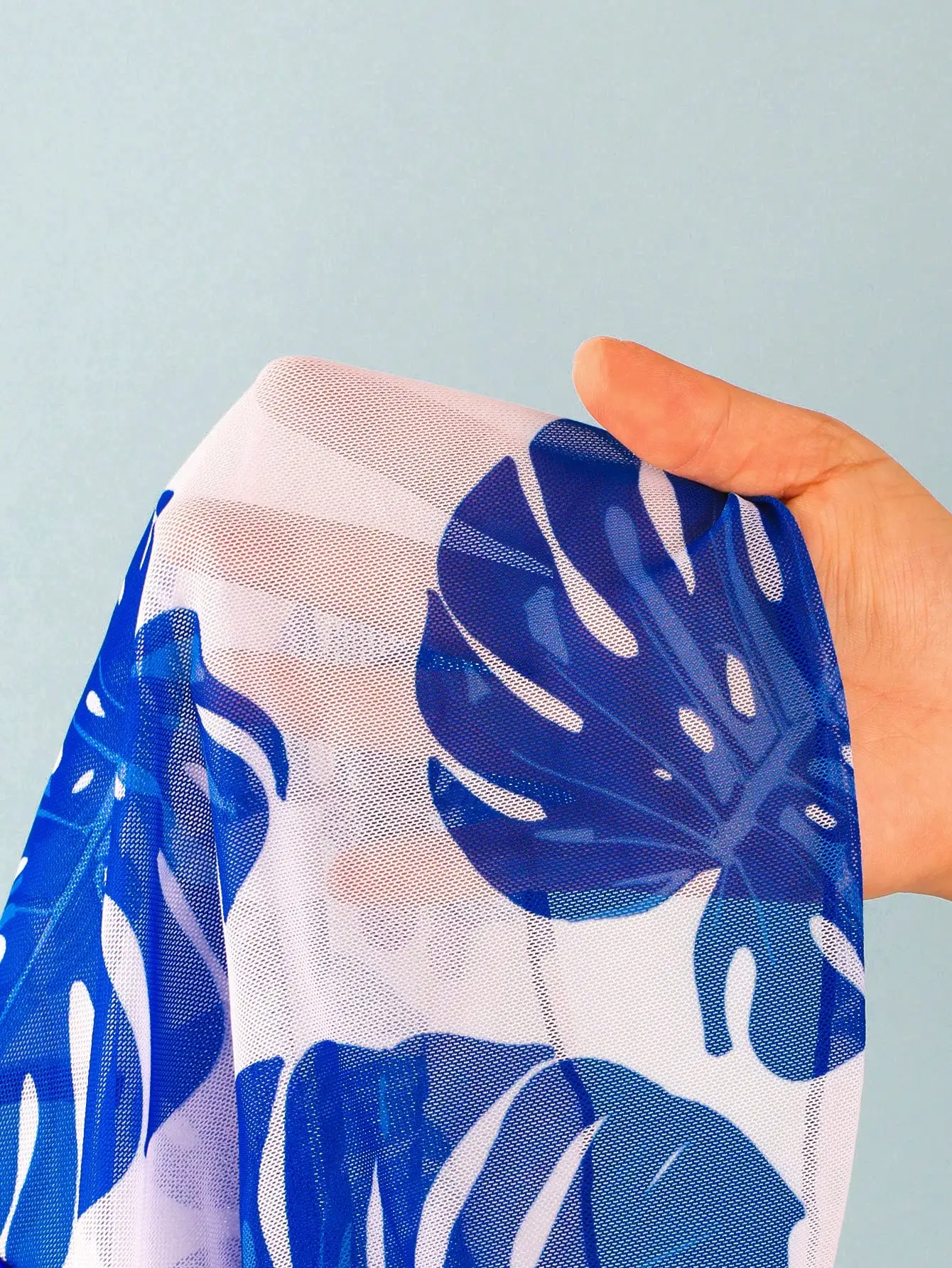 Blue Solid Triangle Bikini Set With Leaf Print Cover-Up Skirt
Blue Solid Triangle Bikini Set With Leaf Print Cover-Up Skirt