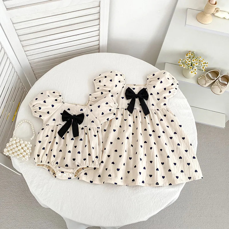 Girls skirt summer new polka dot bubble sleeves baby clothes climbing clothes onesie girls dress sister outfit
Girls skirt summer new polka dot bubble sleeves baby clothes climbing clothes onesie girls dress sister outfit