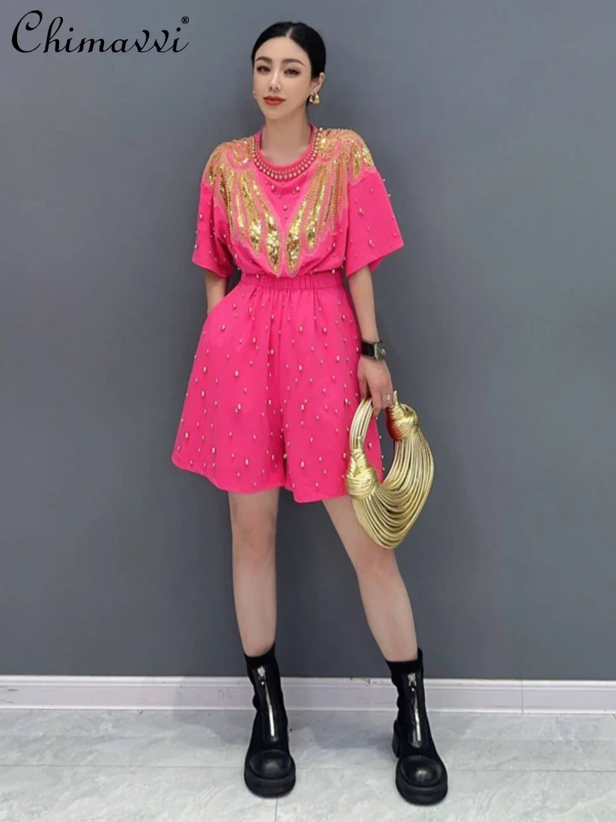 Fashion 2024 Summer New Women's Suit Heavy Round Neck Beaded Short-Sleeved T-shirt Top Shorts Streetwear Ladies Two-Piece Sets
Fashion 2024 Summer New Women's Suit Heavy Round Neck Beaded Short-Sleeved T-shirt Top Shorts Streetwear Ladies Two-Piece Sets
