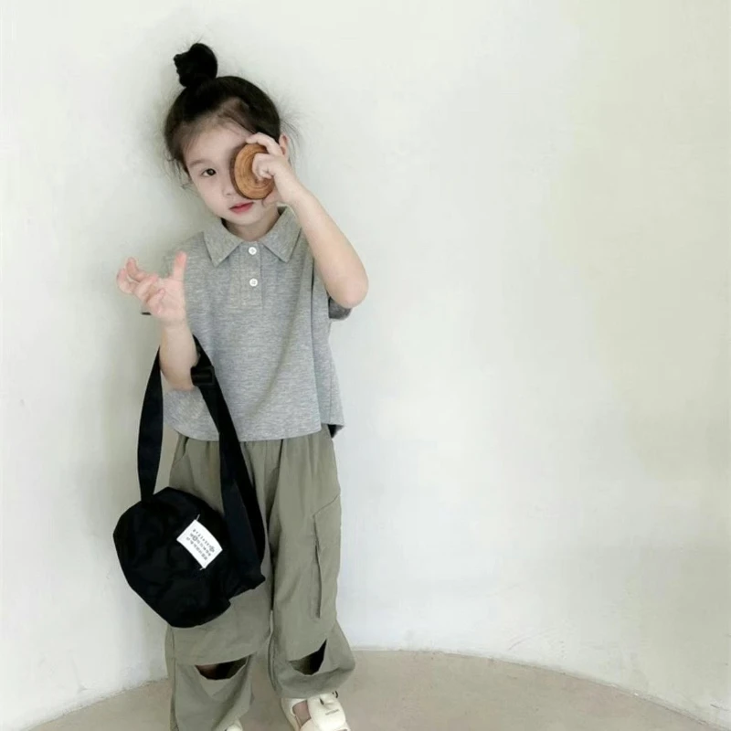 Летняя рубашка-поло для девочек с коротким рукавом, элегантная повседневная, модная, легкая, дышащая, универсальная, для улицы и школы
Летняя рубашка-поло для девочек с коротким рукавом, элегантная повседневная, модная, легкая, дышащая, универсальная, для улицы и школы