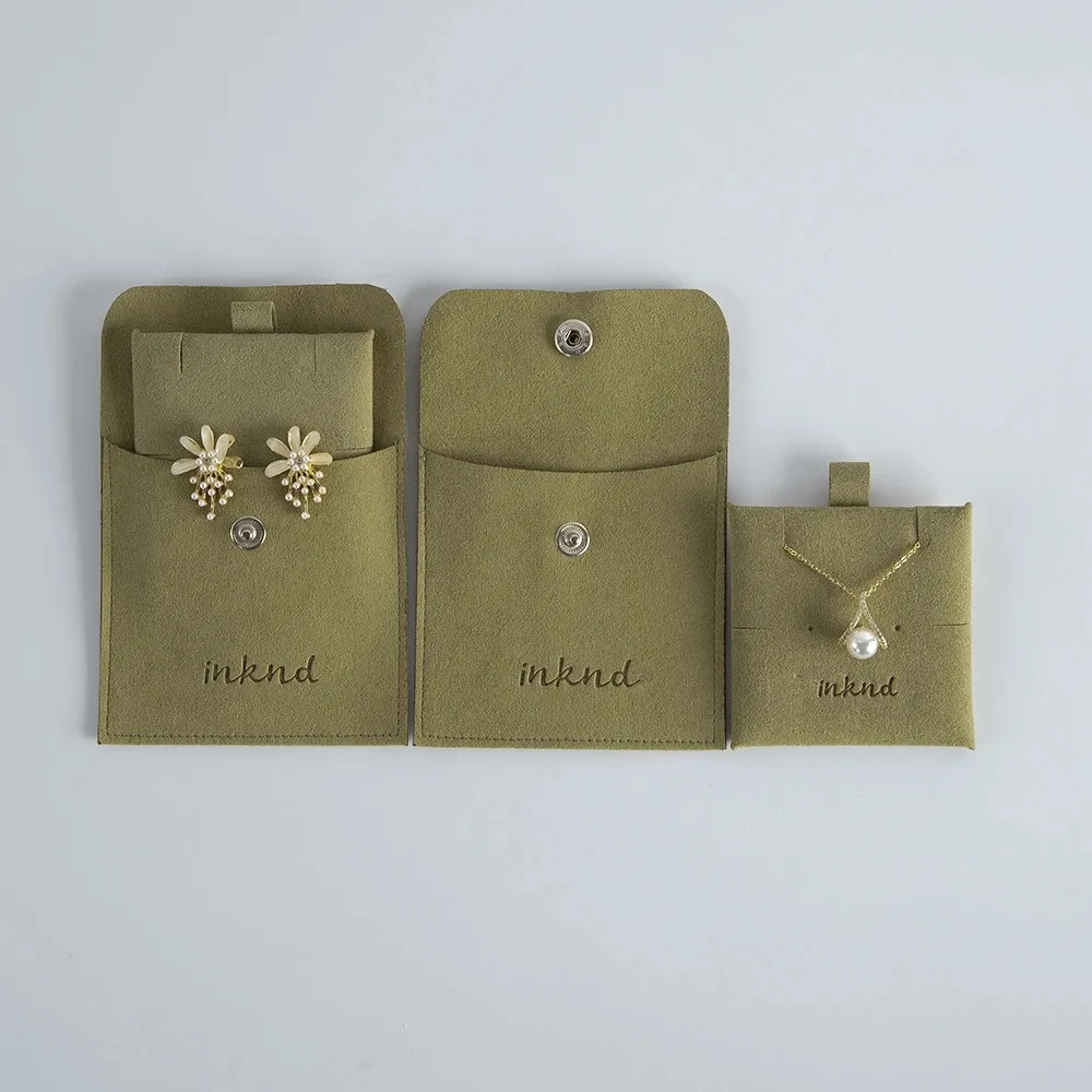 Custom Logo Snap Button Suede Jewelry Packaging Earring Gift Pouch with Insert Pad Cards Microfiber Necklace Ring Organizer Bags
Custom Logo Snap Button Suede Jewelry Packaging Earring Gift Pouch with Insert Pad Cards Microfiber Necklace Ring Organizer Bags