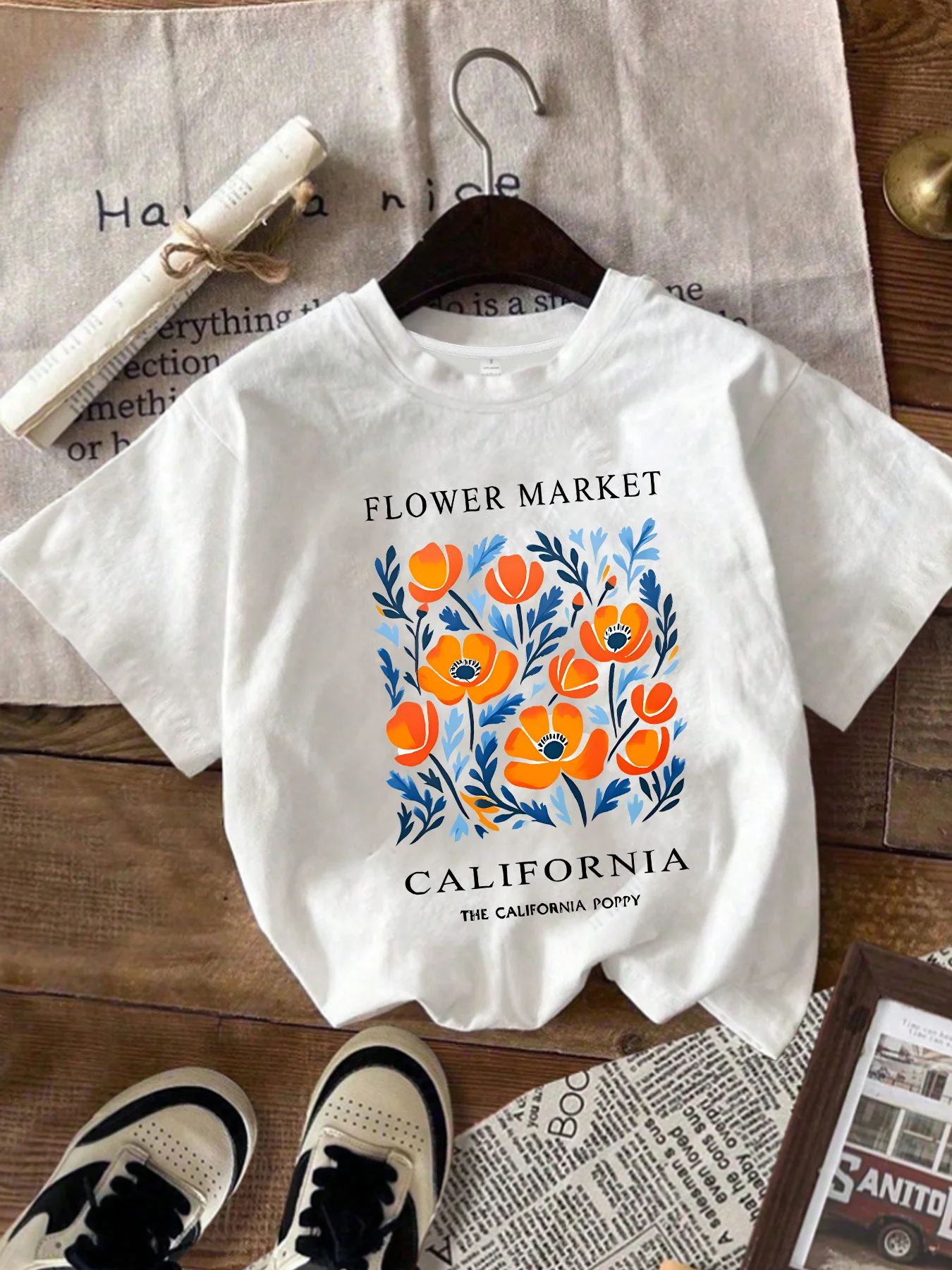 Flower and letter Plus size women's round neck short sleeve T-shirt with elastic half sleeves and trendy prints
Flower and letter Plus size women's round neck short sleeve T-shirt with elastic half sleeves and trendy prints