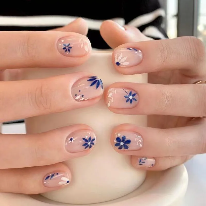 24Pcs Simple Blue Flower Leaf Design Press on Fake Nails Short Square Head False Nails Detachable Finished Full Cover Nails Tips
24Pcs Simple Blue Flower Leaf Design Press on Fake Nails Short Square Head False Nails Detachable Finished Full Cover Nails Tips