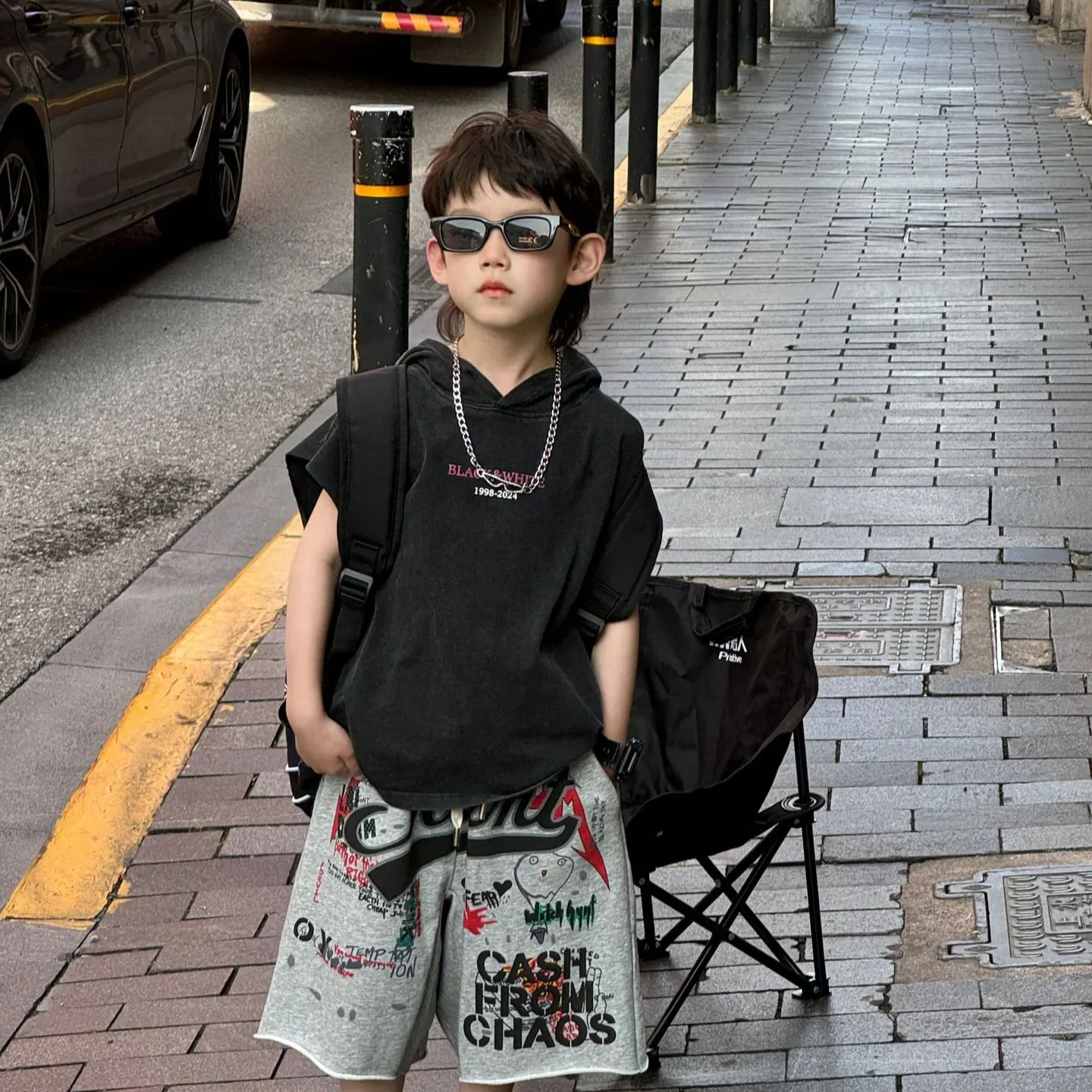 2024 Summer New Korean Style Boys Cool American Printed Sleeveless Hooded T Shirt Children Fashion Casual Handsome T Shirt
2024 Summer New Korean Style Boys Cool American Printed Sleeveless Hooded T Shirt Children Fashion Casual Handsome T Shirt