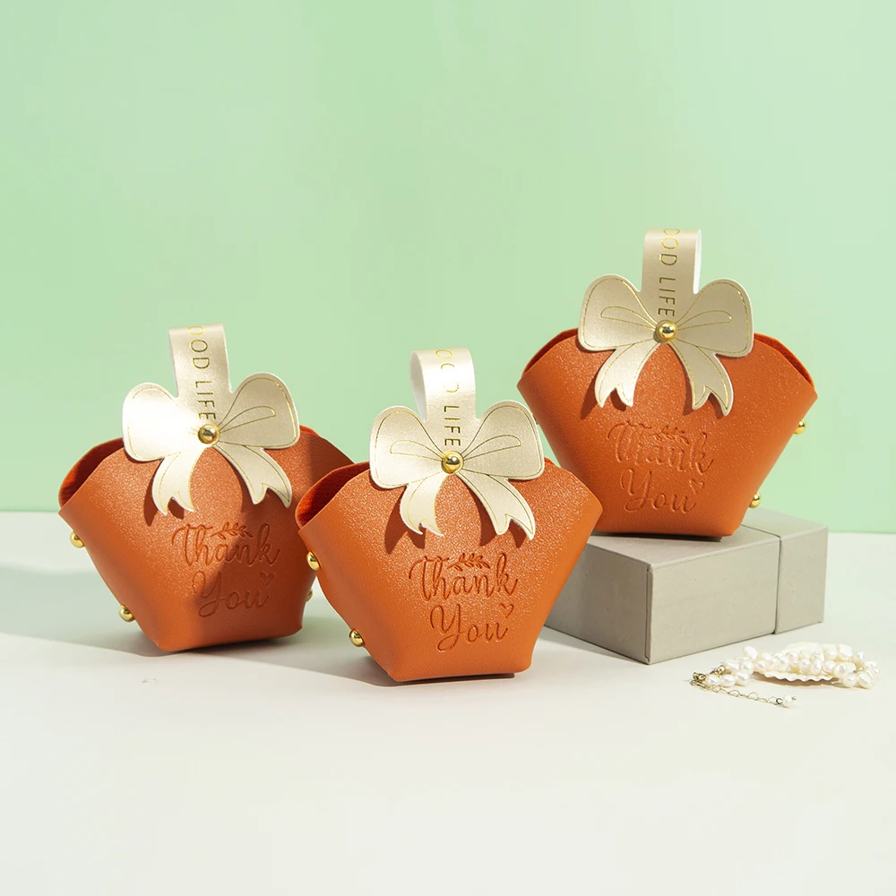 5/10/20/50Pcs Orange Thank You PU Leather Jewelry Candy Bag Basket Pouch with Gold Bowknot Wedding Gift Oli Box for Halloween
5/10/20/50Pcs Orange Thank You PU Leather Jewelry Candy Bag Basket Pouch with Gold Bowknot Wedding Gift Oli Box for Halloween