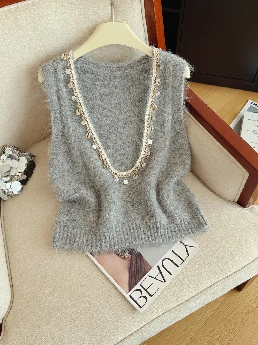 Вязаный жилет Sli Svel для женщин: модный элемент для многослойных образов, осень-зима, ретро-стиль, хлопок, теплый, с U-образным вырезом
Вязаный жилет Sli Svel для женщин: модный элемент для многослойных образов, осень-зима, ретро-стиль, хлопок, теплый, с U-образным вырезом