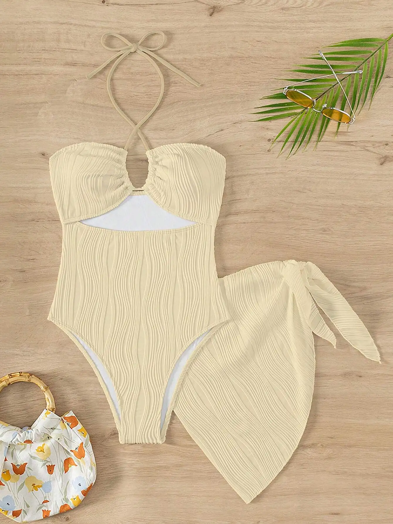 Cream Pleated Cut-Out Halter One-Piece Swimsuit Paired With Tie-Front Wrap Cover-Up For Summer Beach Wear
Cream Pleated Cut-Out Halter One-Piece Swimsuit Paired With Tie-Front Wrap Cover-Up For Summer Beach Wear
