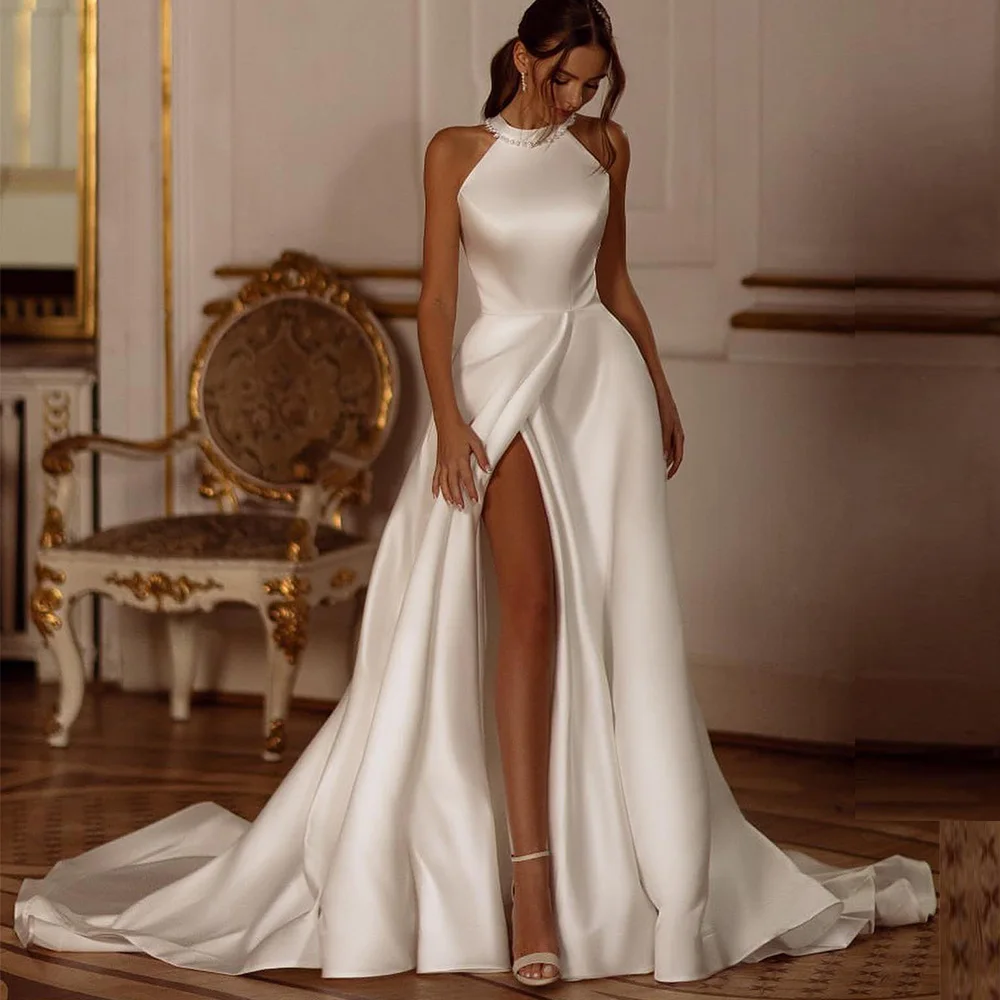 Elegant Halter Pearls Sleeveless Wedding Dresses For Women 2024 High Slit Sexy Backless A Line Bridal Gown Vestidos De Novia
Elegant Halter Pearls Sleeveless Wedding Dresses For Women 2024 High Slit Sexy Backless A Line Bridal Gown Vestidos De Novia