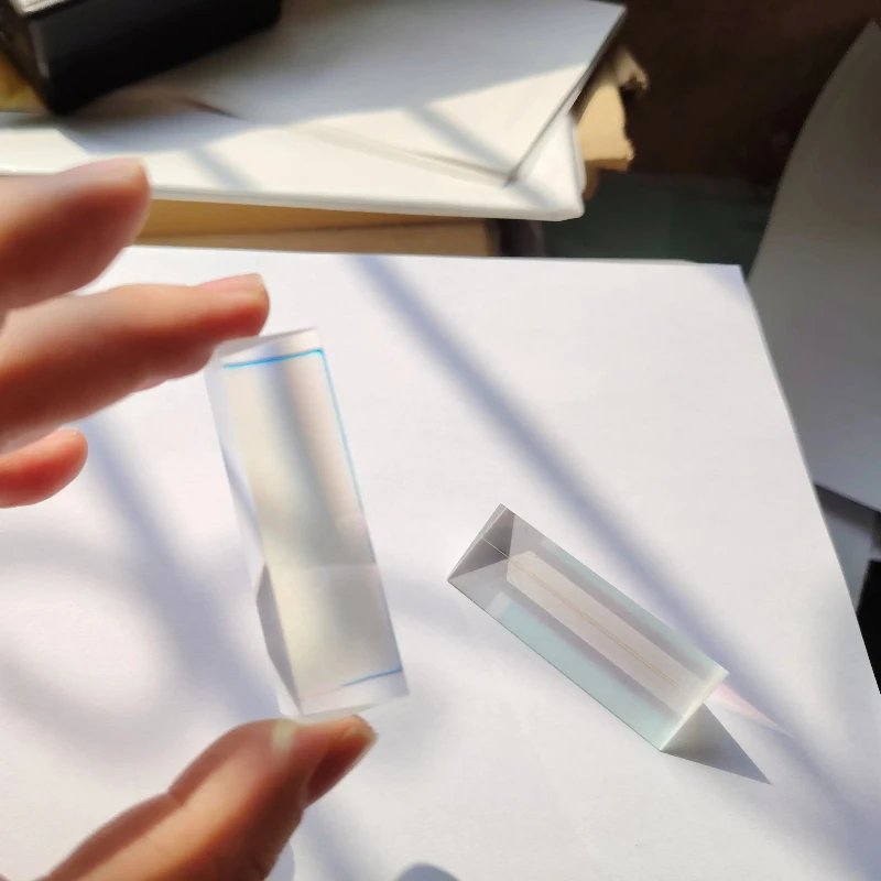2PCS 65x18x18mm Triangular Prism Rainbow Prisma Optical Crystal Glass Studnt Children Physics Experiment Teaching Tools
2PCS 65x18x18mm Triangular Prism Rainbow Prisma Optical Crystal Glass Studnt Children Physics Experiment Teaching Tools