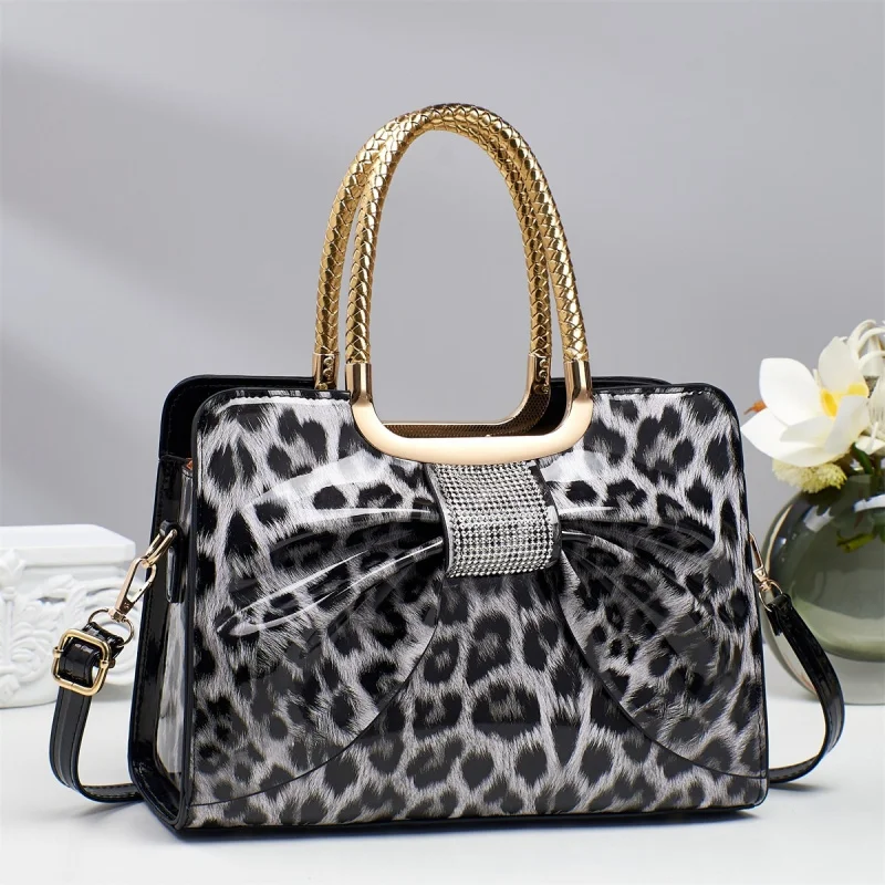 New stylish bowknot simple and elegant women's bag with a high-end feel, leopard print shiny leather shoulder bag
New stylish bowknot simple and elegant women's bag with a high-end feel, leopard print shiny leather shoulder bag