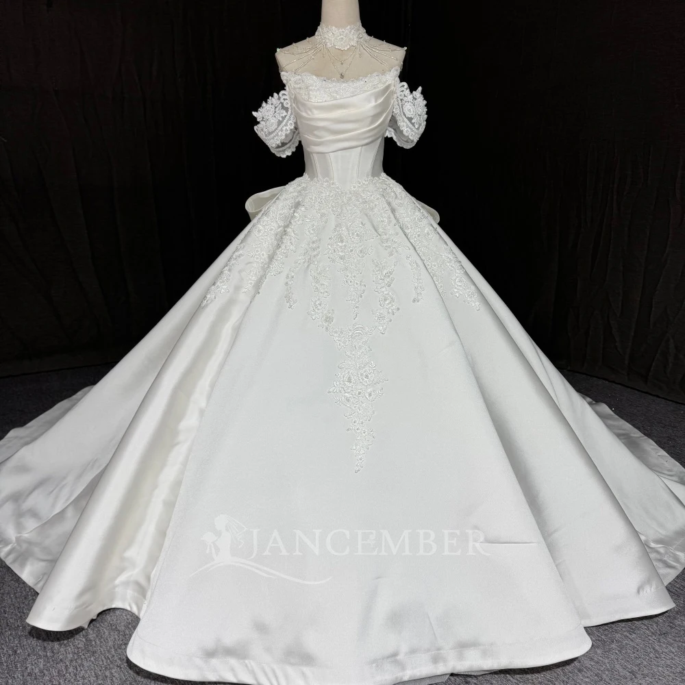 Customized Short Sleeve Court Train Ball Gown Wedding Dresses 2026 With Bow Scoop-Neck Princess Bridal Gown robe de mariée
Customized Short Sleeve Court Train Ball Gown Wedding Dresses 2026 With Bow Scoop-Neck Princess Bridal Gown robe de mariée