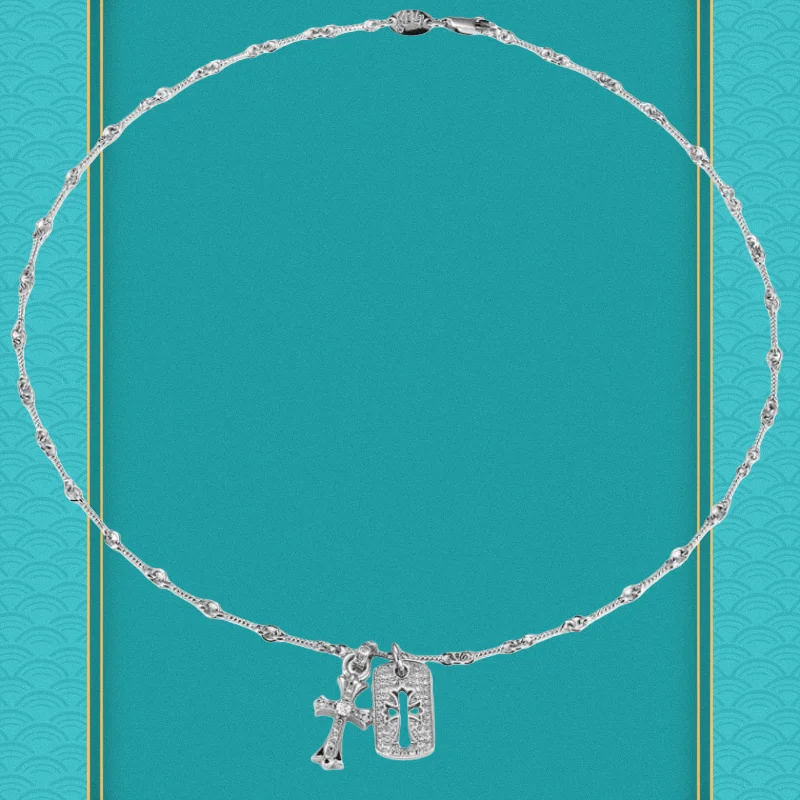 Изящное серебряное колье-колье с подвеской в виде креста, украшенное кристаллами
Изящное серебряное колье-колье с подвеской в виде креста, украшенное кристаллами