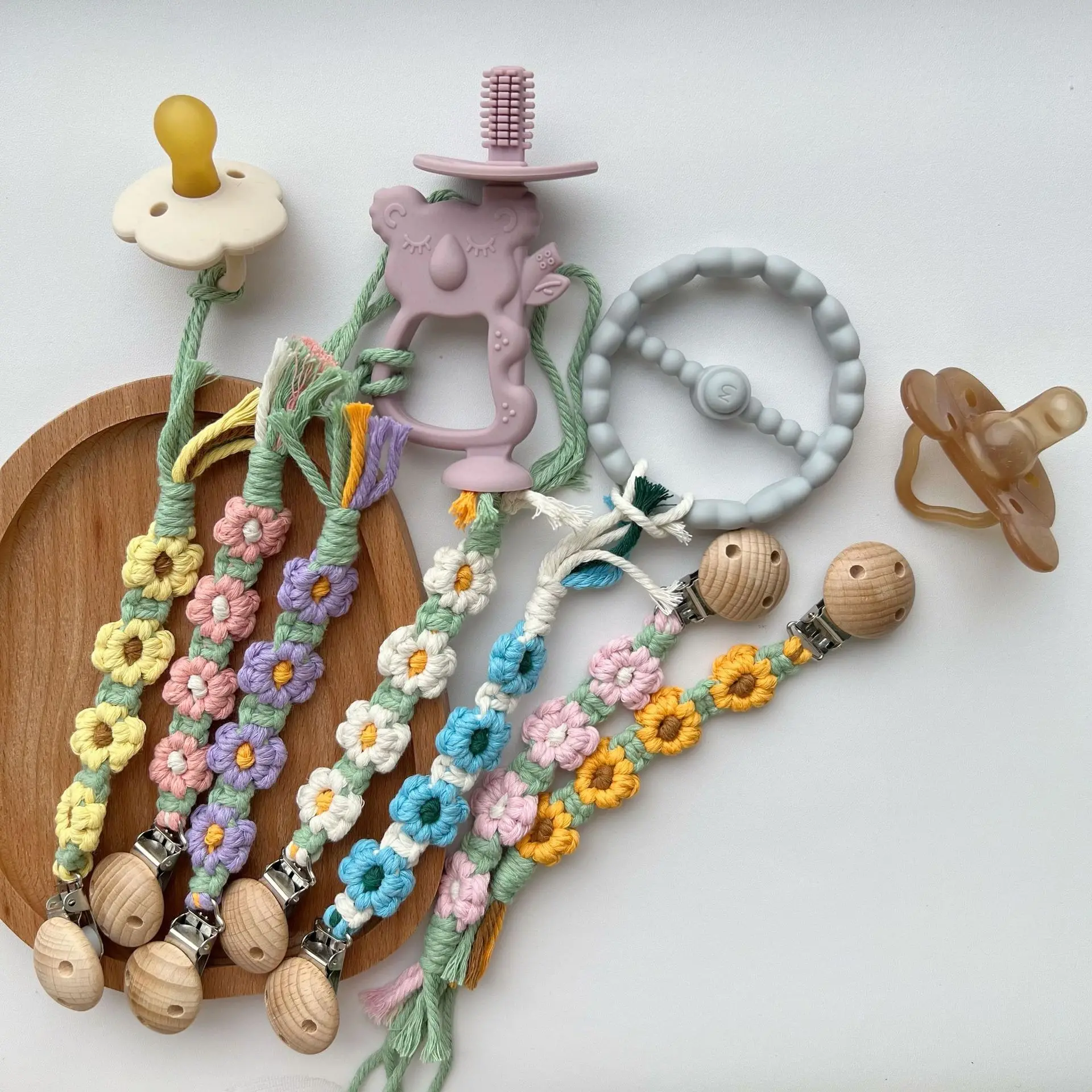 Hot selling pacifier anti loss hanging rope, hand woven flower pacifier hanging rope, newborn baby teething and biting pleasure
Hot selling pacifier anti loss hanging rope, hand woven flower pacifier hanging rope, newborn baby teething and biting pleasure