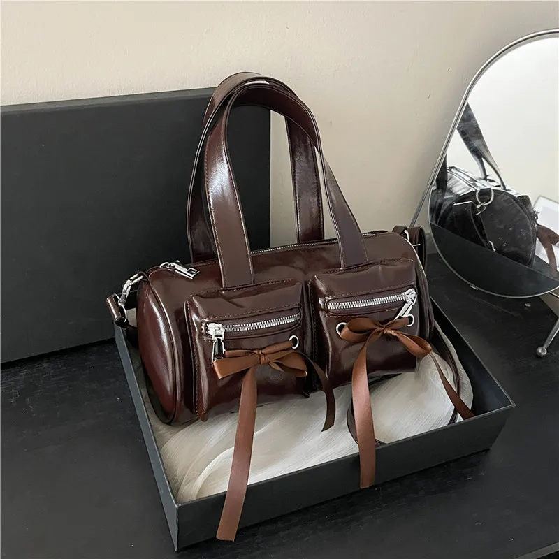 2025 Korean version bow bowling bag spicy girl style large capacity shoulder bag ballet style pleated crossbody bag
2025 Korean version bow bowling bag spicy girl style large capacity shoulder bag ballet style pleated crossbody bag