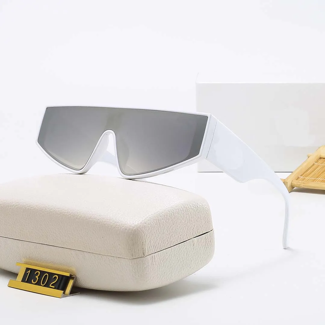 European and American large frame integrated sunglasses personality color hip-hop street shooting all-match trendy glasses
European and American large frame integrated sunglasses personality color hip-hop street shooting all-match trendy glasses