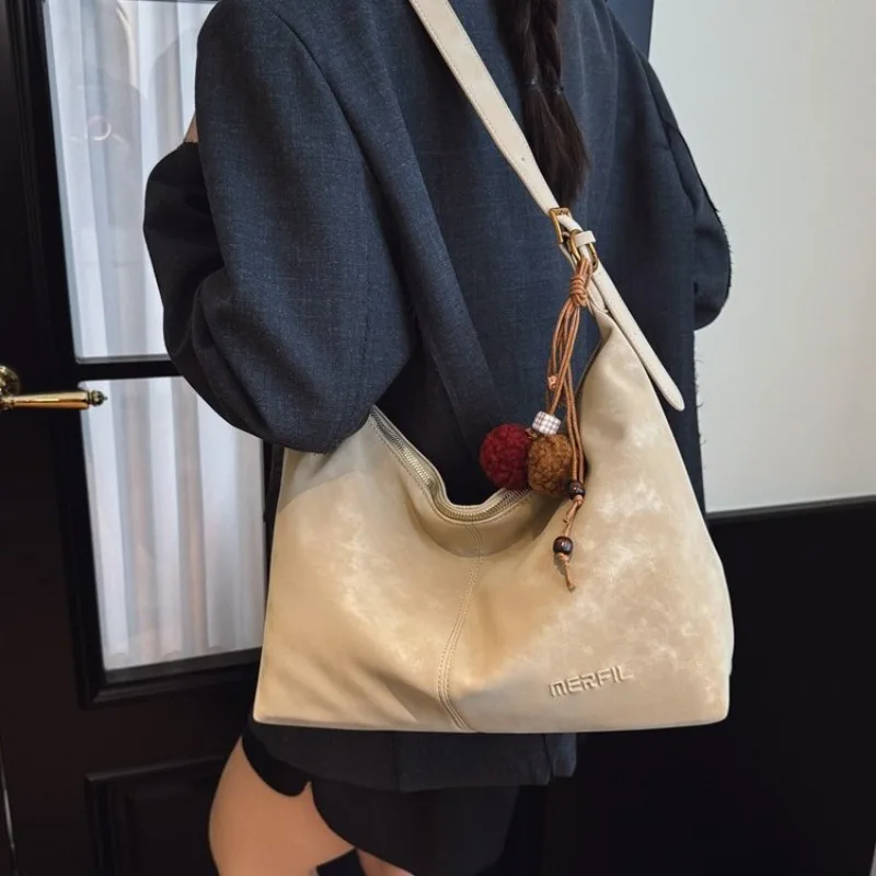 Suede Crescent Hobo Shoulder Bag with Pom Pom Charm, Adjustable Strap, Casual Style for Work, School, Travel & Everyday Errands
Suede Crescent Hobo Shoulder Bag with Pom Pom Charm, Adjustable Strap, Casual Style for Work, School, Travel & Everyday Errands