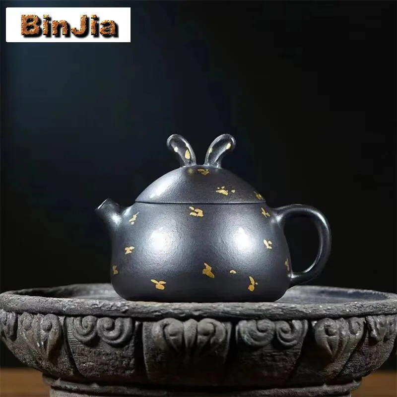 155 мл Исинский фиолетовый глиняный чайник ручной работы с посыпкой, золотой горшок с кроликом, необработанный камень руды, желтый грязевой чайник для заваривания чая, чайник Zisha, подарок
155 мл Исинский фиолетовый глиняный чайник ручной работы с посыпкой, золотой горшок с кроликом, необработанный камень руды, желтый грязевой чайник для заваривания чая, чайник Zisha, подарок