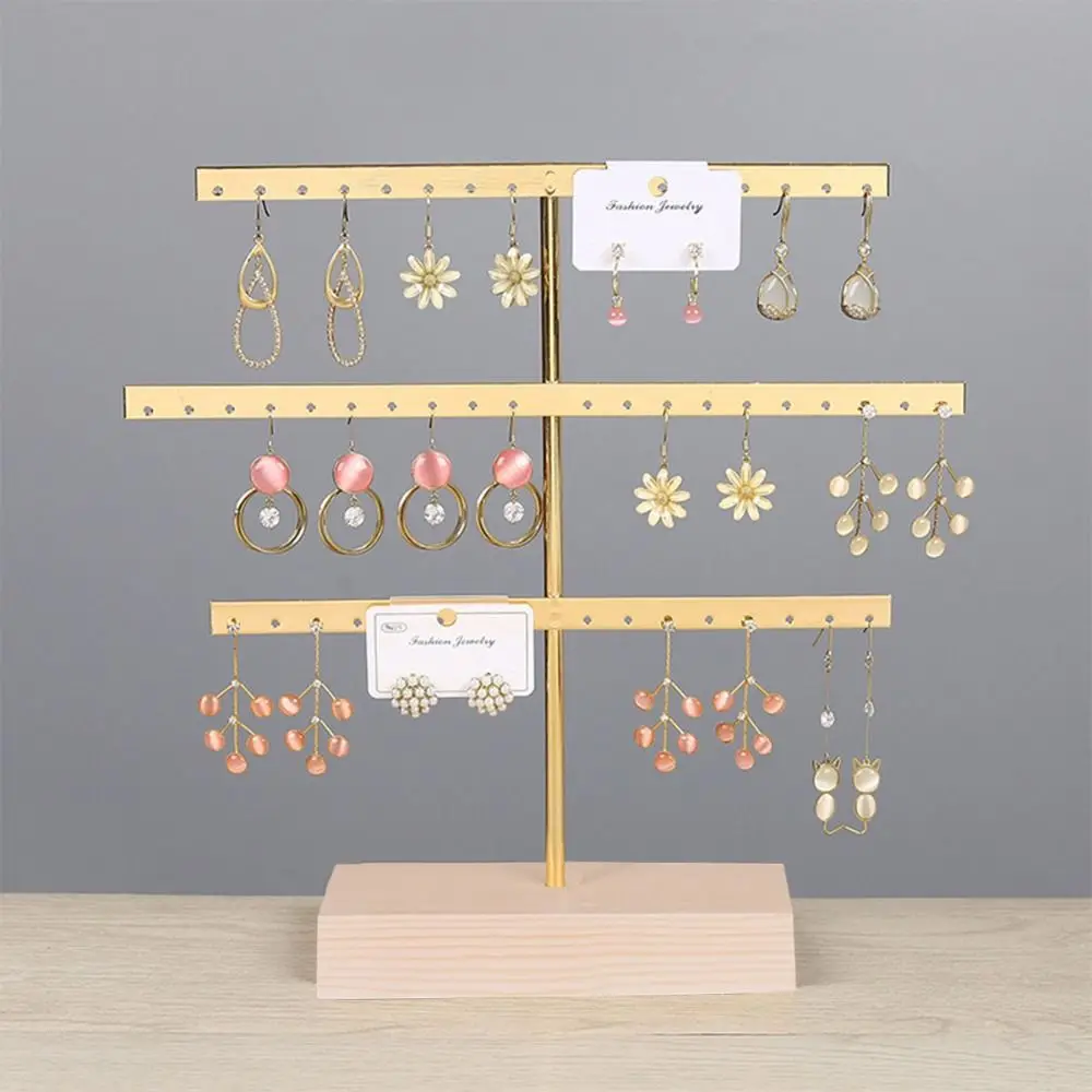 Creative 52 Holes Earrings Display Stand Wooden Base Metal Jewelry Storage Rack Space Saver Bracelet Anklet Stud Holder Desktop
Creative 52 Holes Earrings Display Stand Wooden Base Metal Jewelry Storage Rack Space Saver Bracelet Anklet Stud Holder Desktop