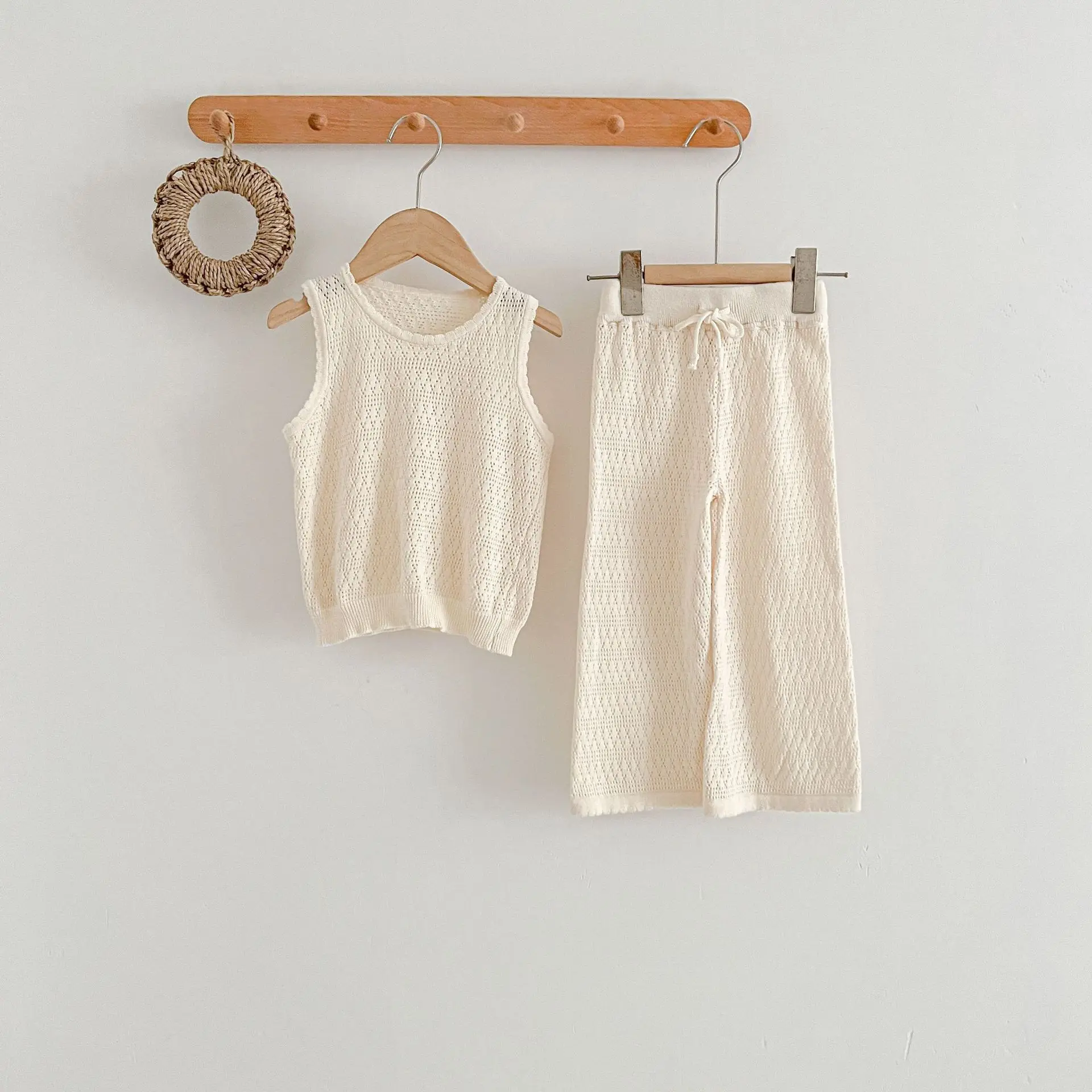 2024 Summer New Children Sleeveless Clothes Set Baby Girls Solid Knitted Vest + Wide Leg Pants Hollow Out 2pcs Suit Kids Outfits
2024 Summer New Children Sleeveless Clothes Set Baby Girls Solid Knitted Vest + Wide Leg Pants Hollow Out 2pcs Suit Kids Outfits