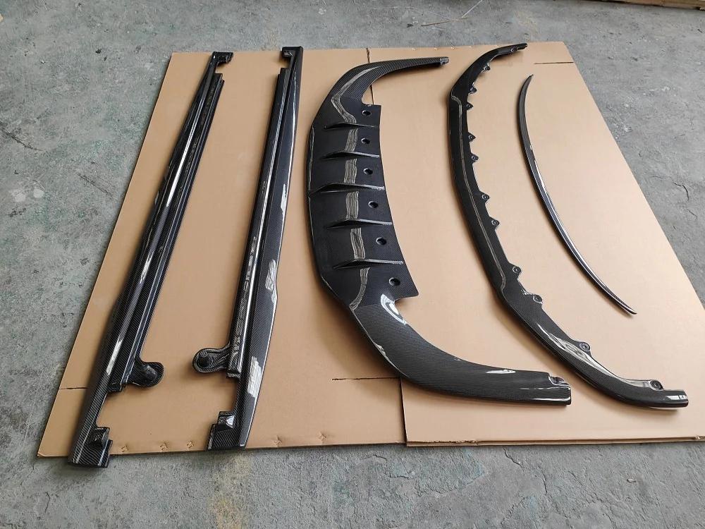 Upgraded Carbon Fiber Front and Rear Diffusers, Side Skirts, and Rear Spoiler Body Kit for the 18 Bentley Continental GT W12
Upgraded Carbon Fiber Front and Rear Diffusers, Side Skirts, and Rear Spoiler Body Kit for the 18 Bentley Continental GT W12