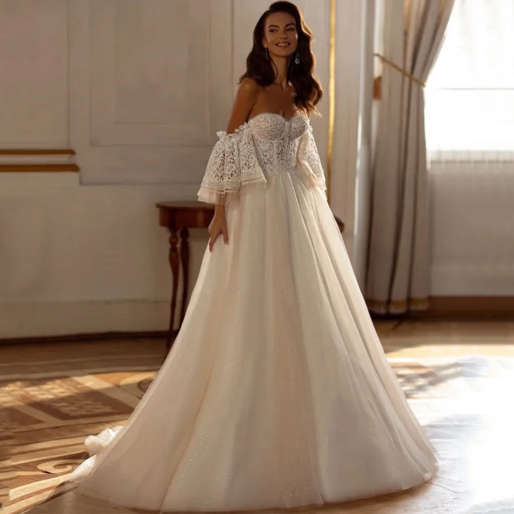 Classic A-Line Floor Length Wedding Dress Sweetheart Off the Shoulder Short Sleeve Lace and Shiny Tulle Bride Customized Gowns
Classic A-Line Floor Length Wedding Dress Sweetheart Off the Shoulder Short Sleeve Lace and Shiny Tulle Bride Customized Gowns