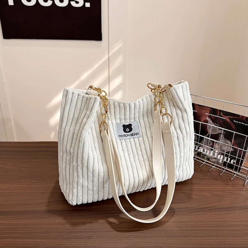 Korean Corduroy Tote Bag With Bear Label Women Gold Chain Shoulder Handbag Large Capacity Casual Shopping Crossbody Purse
Korean Corduroy Tote Bag With Bear Label Women Gold Chain Shoulder Handbag Large Capacity Casual Shopping Crossbody Purse