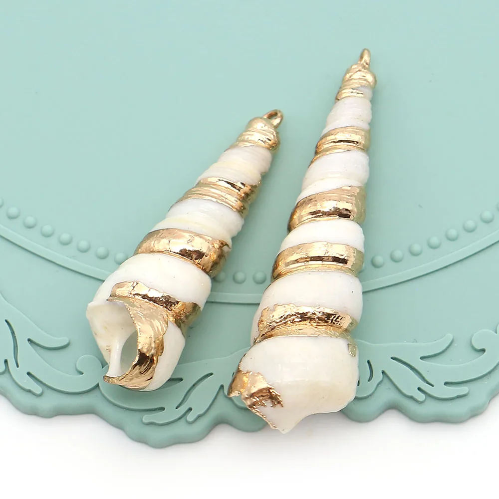 Classic Natural Freshwater White Shell Polished Long Spiral Gold-plated Single-hole Pendant DIY Accessory Material Necklaces
Classic Natural Freshwater White Shell Polished Long Spiral Gold-plated Single-hole Pendant DIY Accessory Material Necklaces