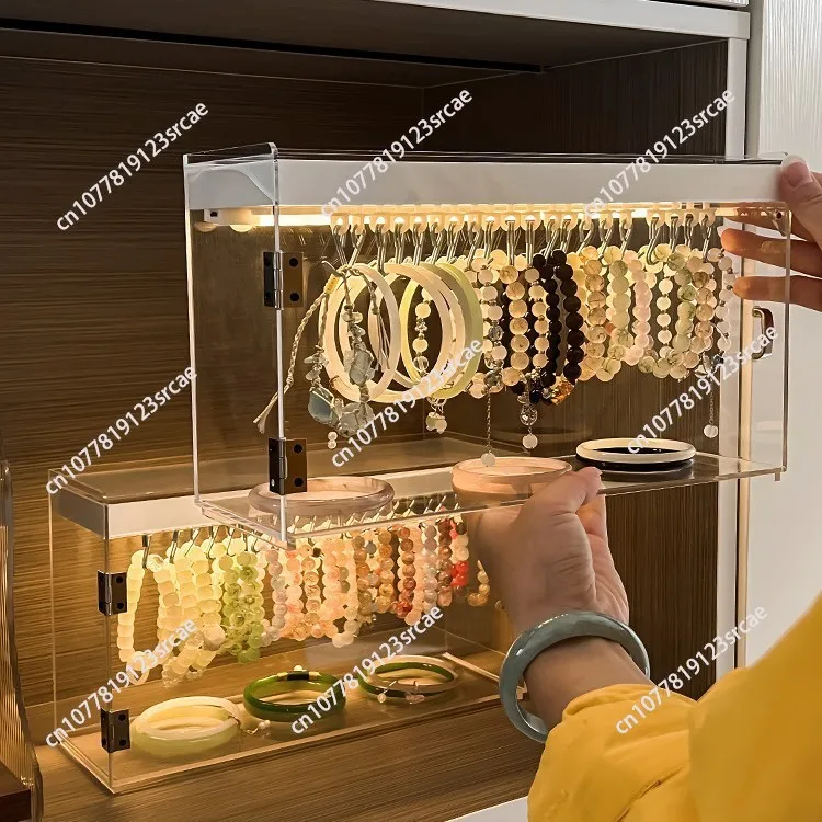 Акриловый пыленепроницаемый прозрачный многослойный шкаф-витрина для украшений, антиквариата и хрустальных браслетов с подсветкой для хранения браслетов.
Акриловый пыленепроницаемый прозрачный многослойный шкаф-витрина для украшений, антиквариата и хрустальных браслетов с подсветкой для хранения браслетов.