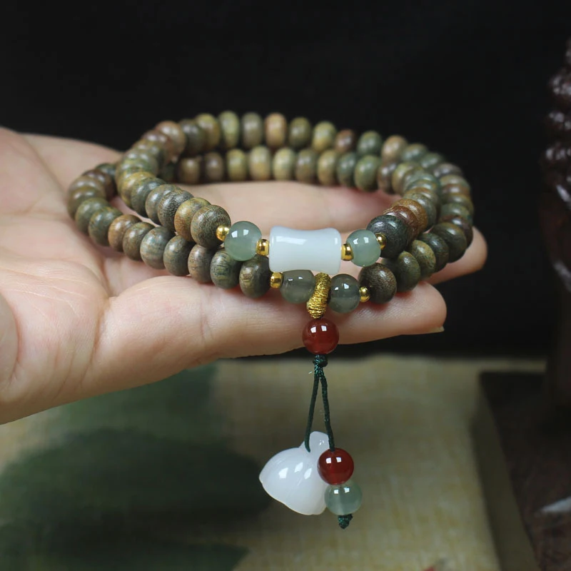 Green sandalwood abacus bead bracelet with fragrance, white lotus pendant Buddhist prayer beads, unisex jewelry
Green sandalwood abacus bead bracelet with fragrance, white lotus pendant Buddhist prayer beads, unisex jewelry