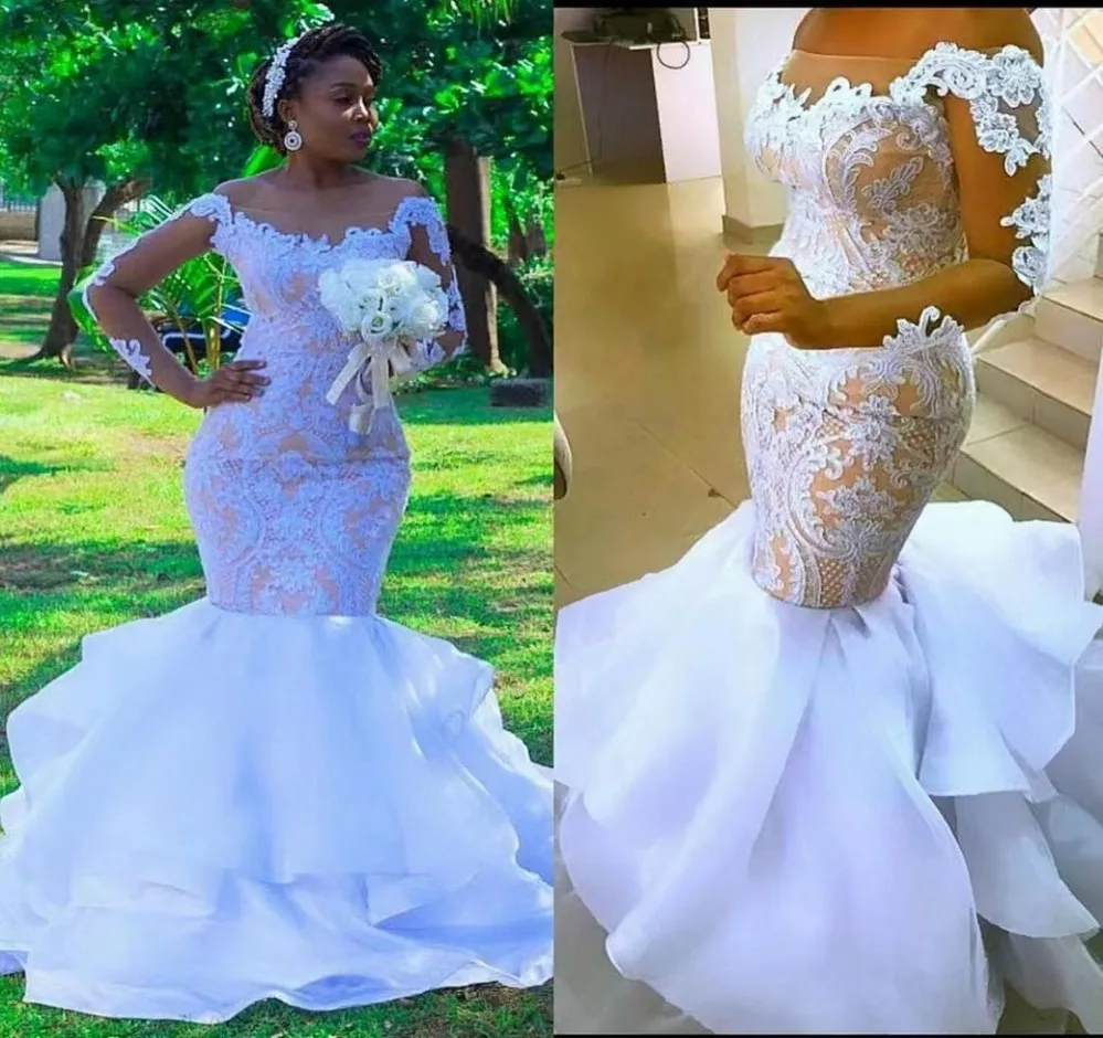 2025 African Mermaid Wedding Dress Off the Shoulder Lace Appliques Ruffles Tieres Organza Bride Gown Vestidos De Noiva
2025 African Mermaid Wedding Dress Off the Shoulder Lace Appliques Ruffles Tieres Organza Bride Gown Vestidos De Noiva