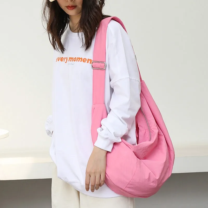 Japanese-style casual artistic dumpling bag, trendy nylon shoulder bag, minimalistic crossbody bag for women
Japanese-style casual artistic dumpling bag, trendy nylon shoulder bag, minimalistic crossbody bag for women