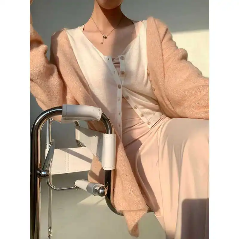 Женское шерстяное пальто Sweet Sle ранней осени, длинный свитер свеча с нежным дизайном ножа, ультратонкий кардиган из полиэфирного волокна
Женское шерстяное пальто Sweet Sle ранней осени, длинный свитер свеча с нежным дизайном ножа, ультратонкий кардиган из полиэфирного волокна