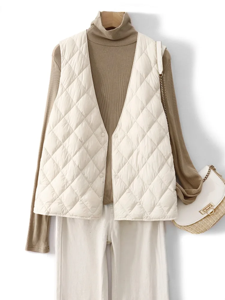 Легкий облегающий пуховый хлопковый жилет, женский зимний свободный внутренний теплый жилет с v-образным вырезом, стеганый однобортный жилет
Легкий облегающий пуховый хлопковый жилет, женский зимний свободный внутренний теплый жилет с v-образным вырезом, стеганый однобортный жилет