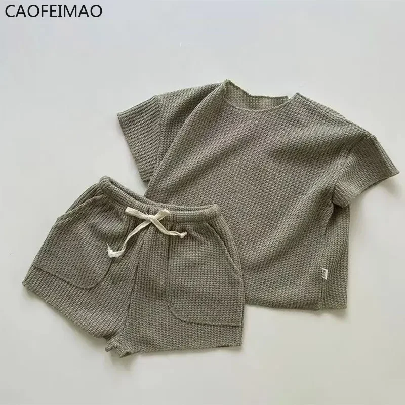 2Pcs Summer Boys Girls Clothing Sets Solid Color Soft Loose Short Sleeve Drawstring Shorts Waffle Outfits Children Knitted Suits
2Pcs Summer Boys Girls Clothing Sets Solid Color Soft Loose Short Sleeve Drawstring Shorts Waffle Outfits Children Knitted Suits
