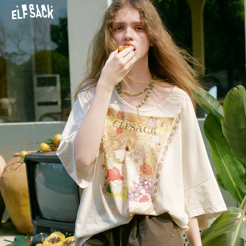 ELFSACK Women's Retro Oversized T-Shirt with Vintage Fruit Floral Fringe Frame Graphic Print, Short Sleeve Loose Tee for Summer
ELFSACK Women's Retro Oversized T-Shirt with Vintage Fruit Floral Fringe Frame Graphic Print, Short Sleeve Loose Tee for Summer