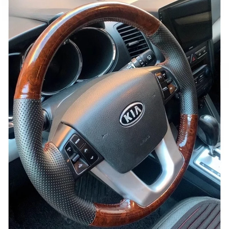 100% Fit For Kia K5 Optima 2008-2013 Hand-stitched non-slip black Genuine leather Peach wood grain car steering wheel cover
100% Fit For Kia K5 Optima 2008-2013 Hand-stitched non-slip black Genuine leather Peach wood grain car steering wheel cover