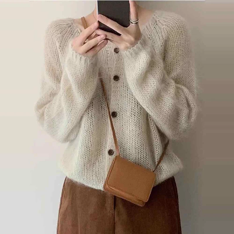 French Style Thin Knitted Cardigans Women Spring New Single Breasted Hollow Out Sweater Coats Simple Elegant Knitwear Tops
French Style Thin Knitted Cardigans Women Spring New Single Breasted Hollow Out Sweater Coats Simple Elegant Knitwear Tops