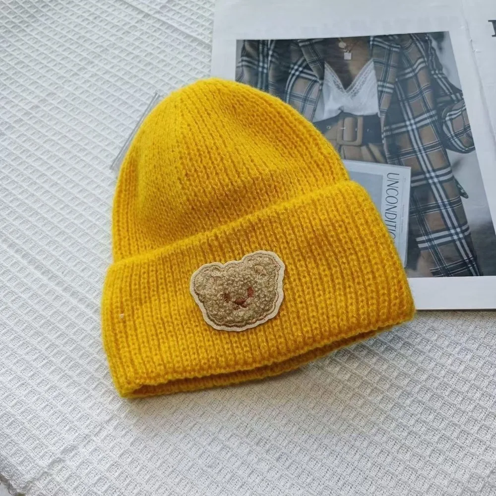 Новые утолщенные шапки с капюшоном, зимняя теплая защитная шапка для ушей, вязаная шапка с милым медведем, осень-зима
Новые утолщенные шапки с капюшоном, зимняя теплая защитная шапка для ушей, вязаная шапка с милым медведем, осень-зима