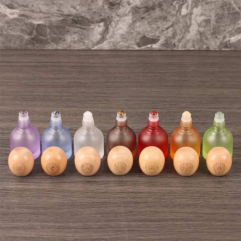 100pcs/lots 10ml High Grade Colored Glass Roll on Essential Oil Bottle with Spherical Peach Wood Lid Jade Roller on Bottle
100pcs/lots 10ml High Grade Colored Glass Roll on Essential Oil Bottle with Spherical Peach Wood Lid Jade Roller on Bottle