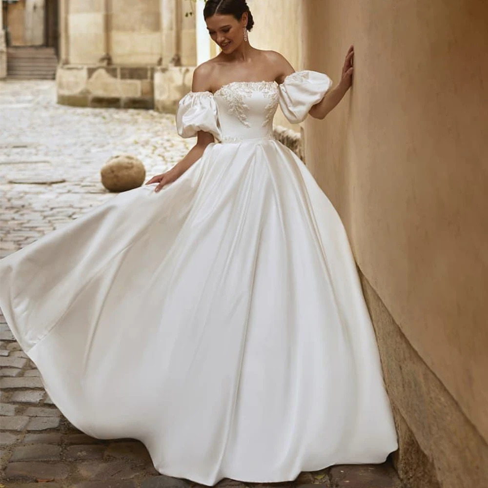 Elegant Satin Bride Wedding Dress Strapless Short Puff Sleeve Classic A-Line Floor Length with Applique Lace Up Customized Gown
Elegant Satin Bride Wedding Dress Strapless Short Puff Sleeve Classic A-Line Floor Length with Applique Lace Up Customized Gown