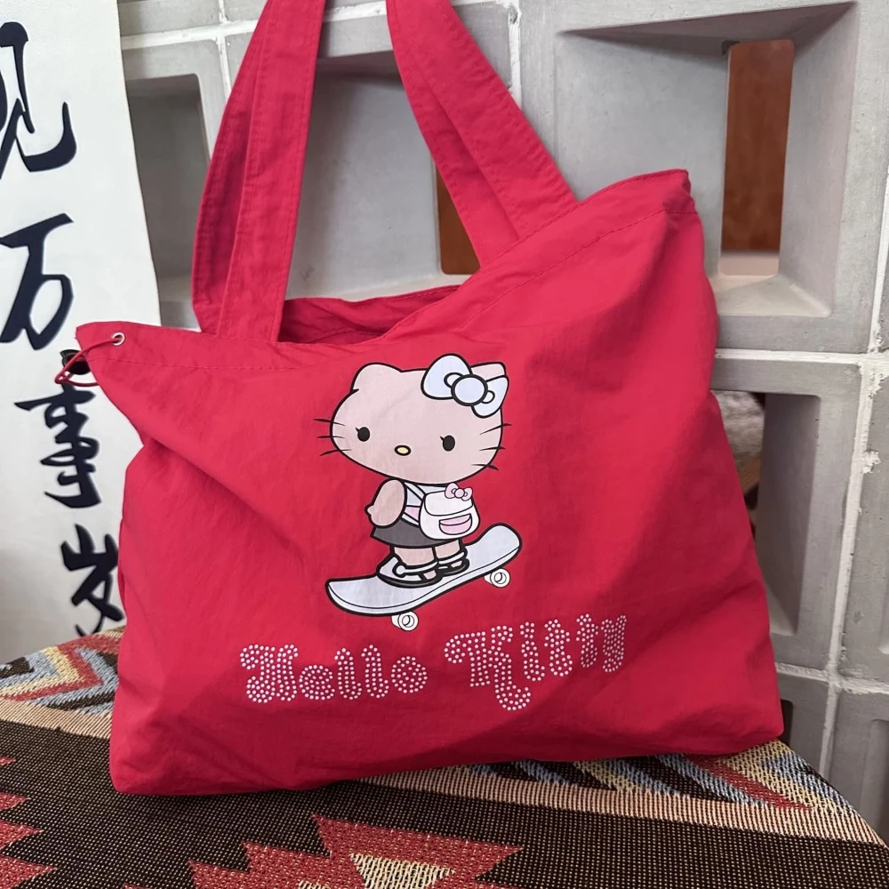 Hello Kitty Women's Shoulder Bag Sanrio Kawaii one-shoulder tote bag large capacity cartoon student cute new commuting handbag
Hello Kitty Women's Shoulder Bag Sanrio Kawaii one-shoulder tote bag large capacity cartoon student cute new commuting handbag